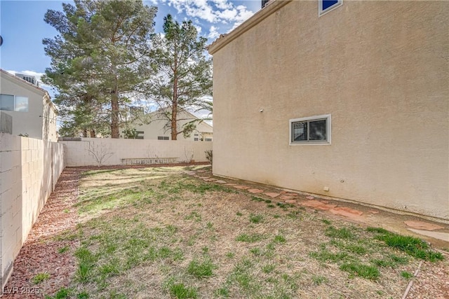 view of yard featuring a fenced backyard