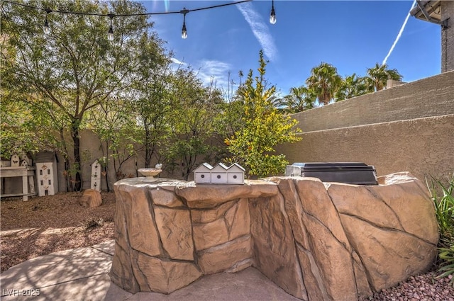 view of patio / terrace with fence