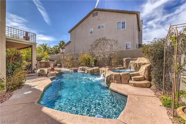 view of swimming pool with a fenced backyard and a fenced in pool