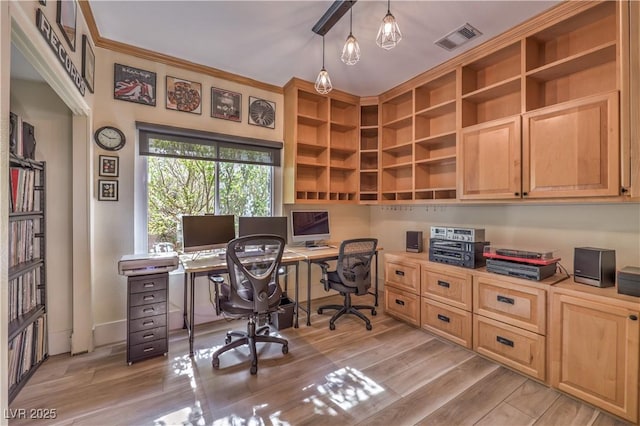 office featuring light wood finished floors and visible vents