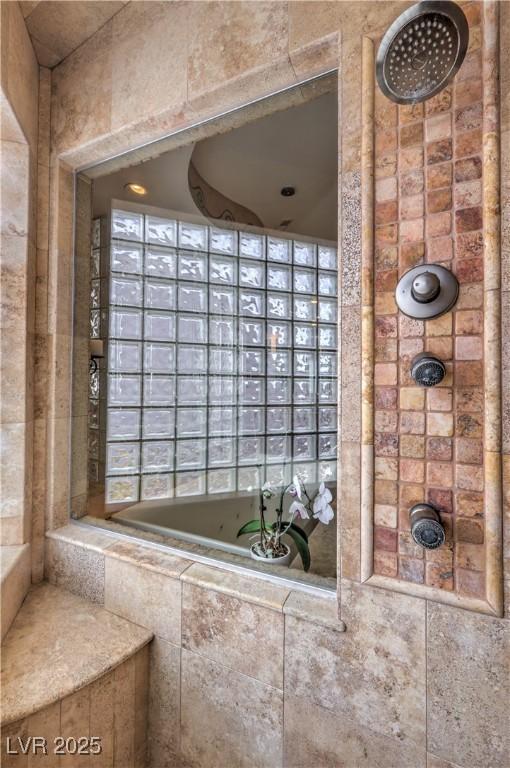 full bathroom featuring a tile shower