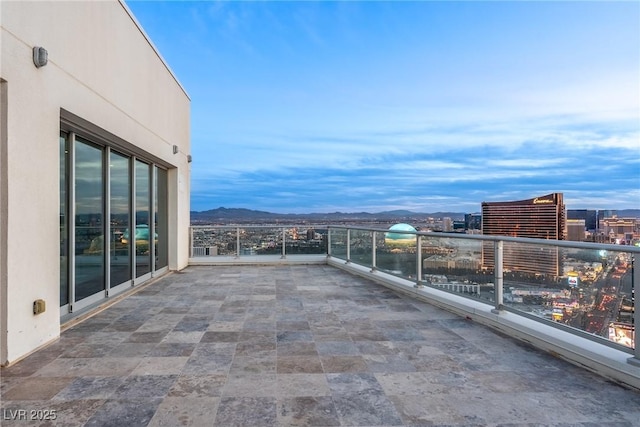 balcony featuring a city view