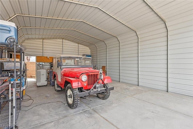 garage featuring a detached carport