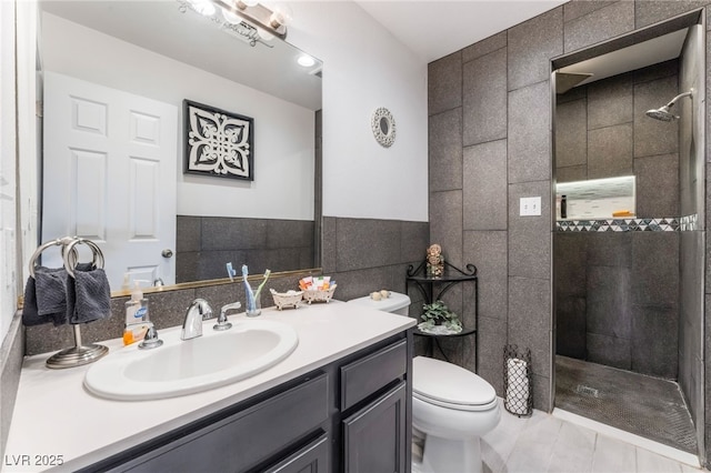 bathroom featuring a walk in shower, toilet, tile patterned flooring, and vanity