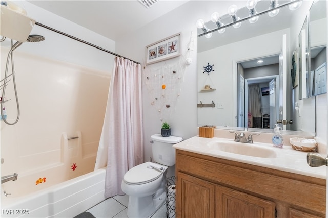 bathroom featuring shower / bath combo, vanity, toilet, and tile patterned floors