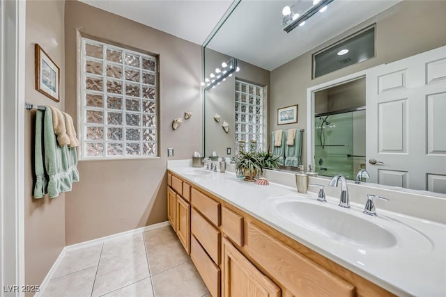 full bath with tile patterned flooring, a shower with door, a sink, and double vanity