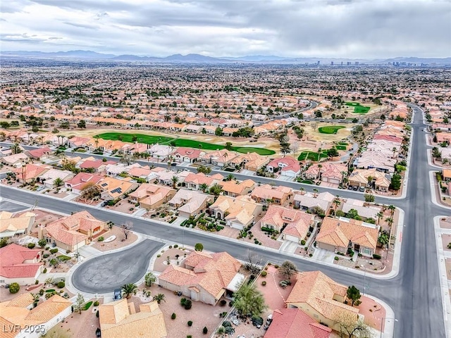 birds eye view of property featuring a residential view and a mountain view