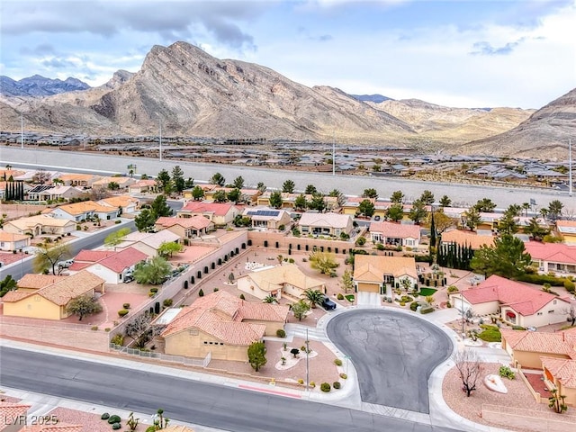 drone / aerial view with a residential view and a mountain view