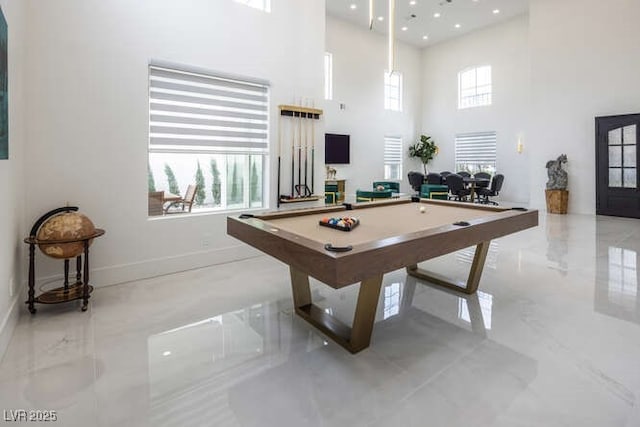 game room with recessed lighting, pool table, a towering ceiling, baseboards, and marble finish floor