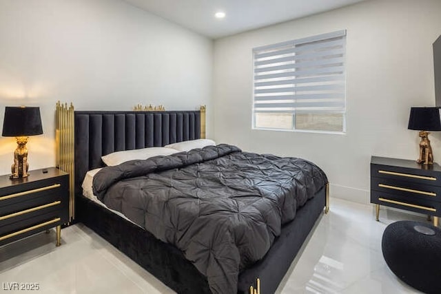 bedroom featuring recessed lighting and baseboards