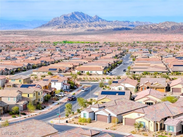 bird's eye view with a residential view and a mountain view