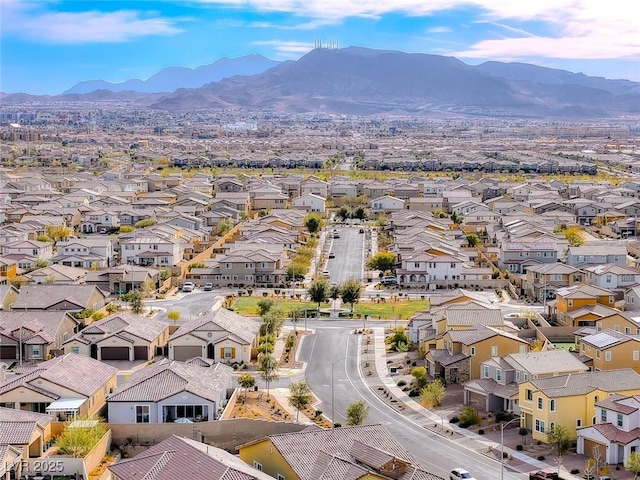 bird's eye view with a residential view and a mountain view