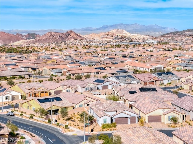 bird's eye view featuring a residential view and a mountain view