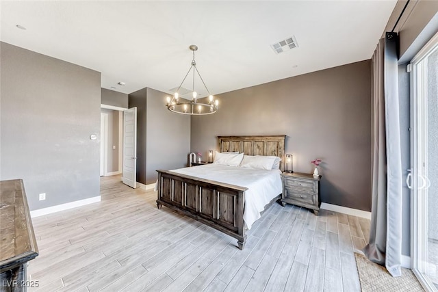 bedroom with a chandelier, baseboards, visible vents, and light wood finished floors