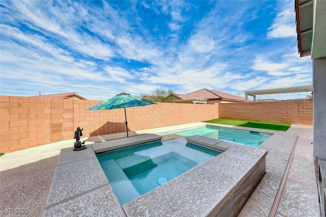 view of pool with an in ground hot tub and a fenced backyard