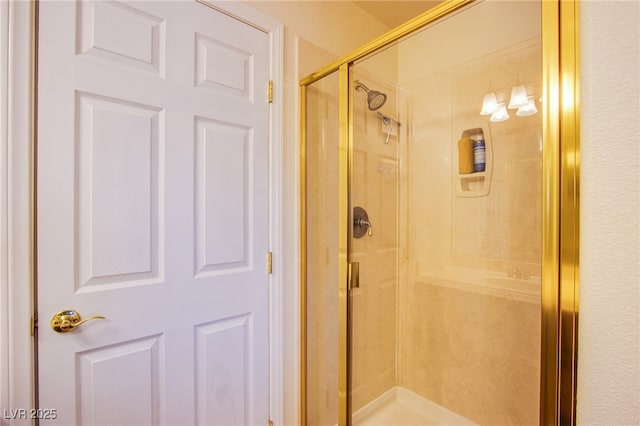 full bath with a shower stall