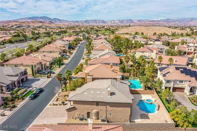 drone / aerial view featuring a mountain view and a residential view