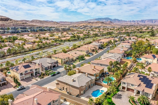 aerial view with a mountain view and a residential view