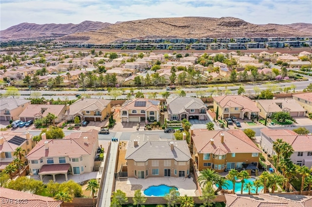 bird's eye view featuring a mountain view and a residential view