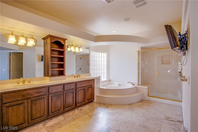 full bathroom with a sink, a stall shower, double vanity, and a bath