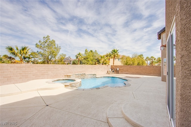 view of swimming pool with a patio, a fenced backyard, and a pool with connected hot tub