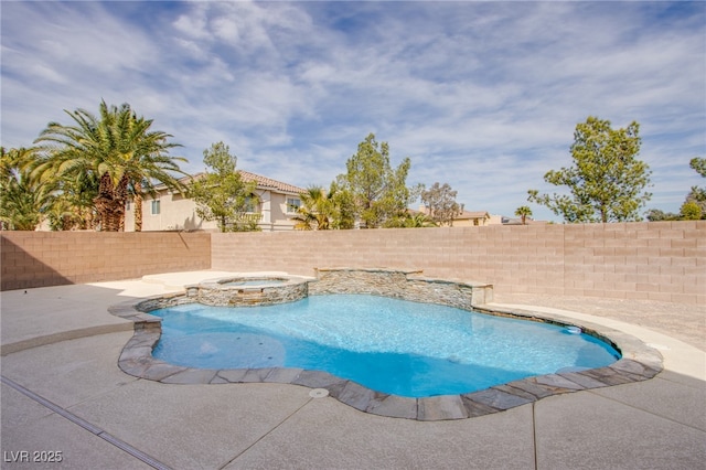 view of pool with a patio area, a pool with connected hot tub, and a fenced backyard