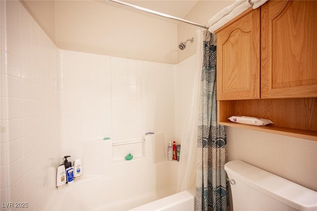 full bath with toilet and shower / bath combo with shower curtain