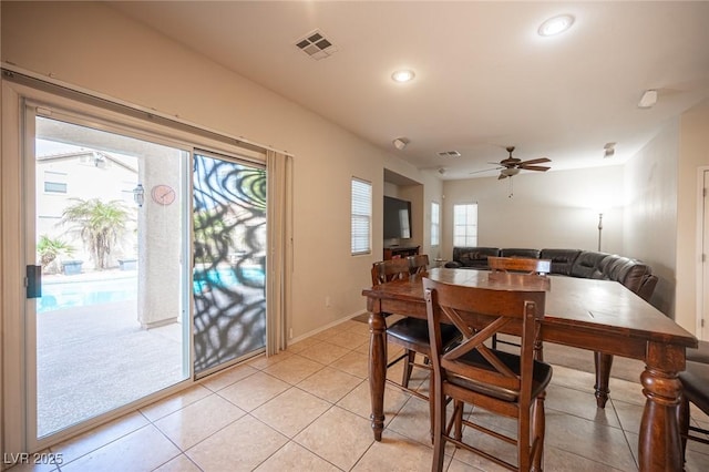 dining area featuring ceiling fan, light tile patterned floors, recessed lighting, visible vents, and baseboards