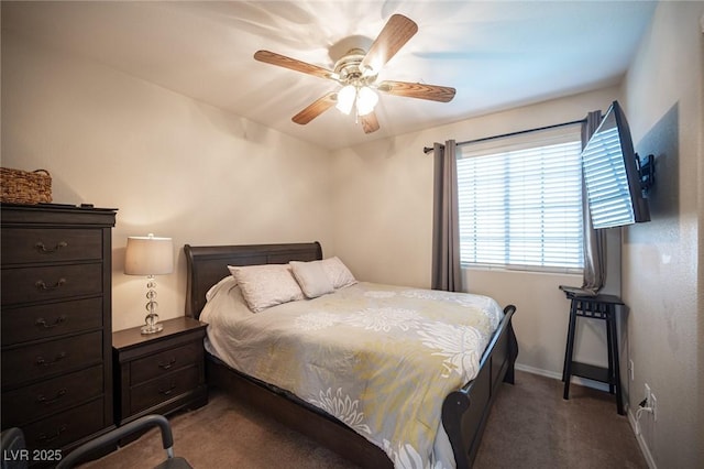 bedroom featuring a ceiling fan, carpet flooring, and baseboards