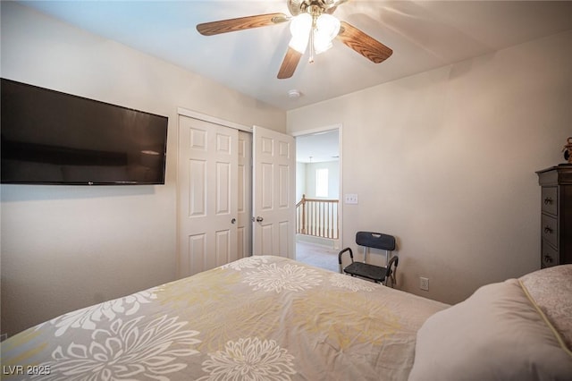 bedroom featuring a ceiling fan and a closet