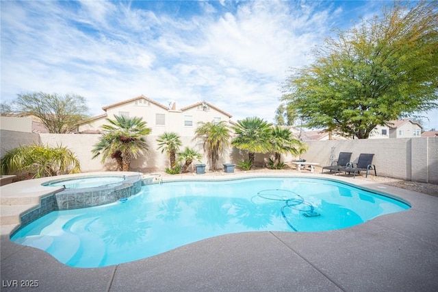 view of swimming pool featuring a fenced backyard and a pool with connected hot tub