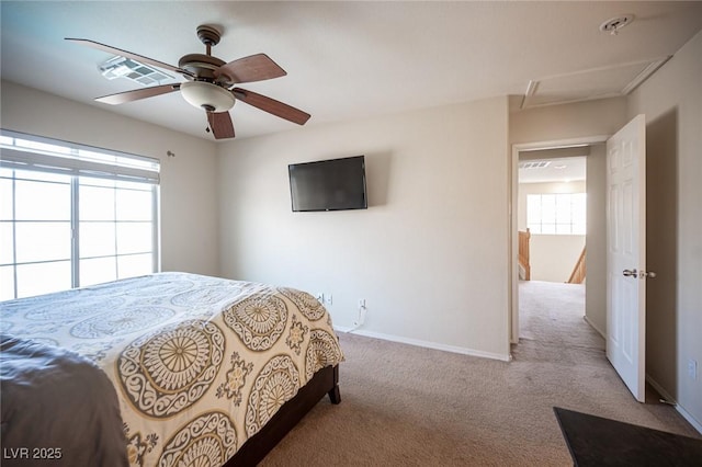 bedroom with carpet floors, baseboards, and a ceiling fan