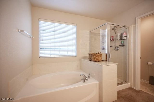 full bath with a garden tub and a shower stall