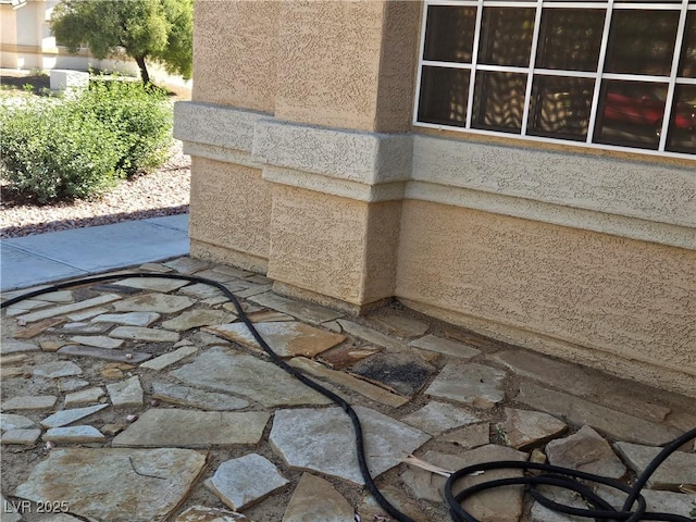 details featuring stucco siding