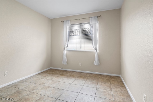 845 Holly Lake Way, Henderson, NV 89002 - tiled empty room featuring baseboards