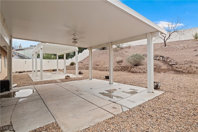 view of patio / terrace with ceiling fan, a pergola, and a fenced backyard