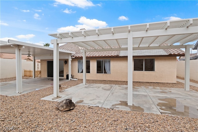 view of patio featuring fence and a pergola