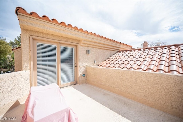 view of patio / terrace with a balcony