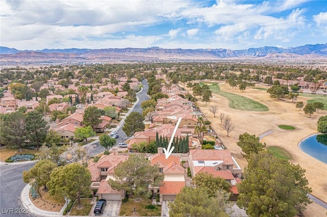 drone / aerial view featuring a mountain view and a residential view