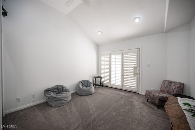 unfurnished room with vaulted ceiling, carpet flooring, a ceiling fan, and baseboards