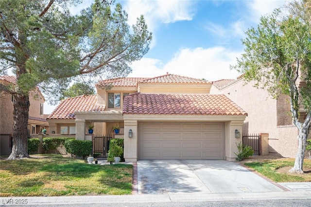 mediterranean / spanish-style house with a tiled roof, fence, and stucco siding