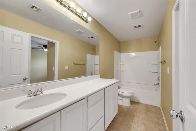 full bathroom featuring toilet, bathtub / shower combination, vanity, and visible vents