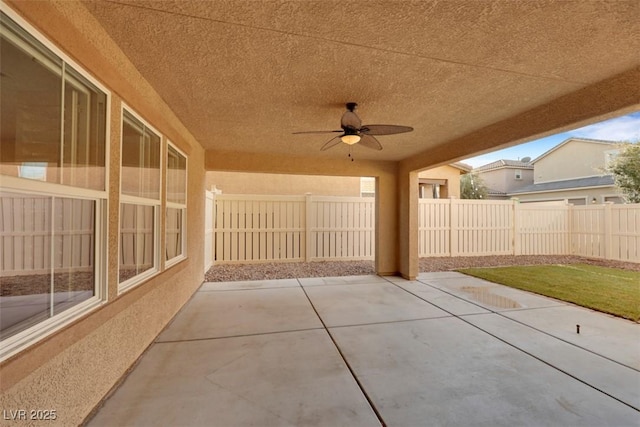 view of patio / terrace with ceiling fan and a fenced backyard