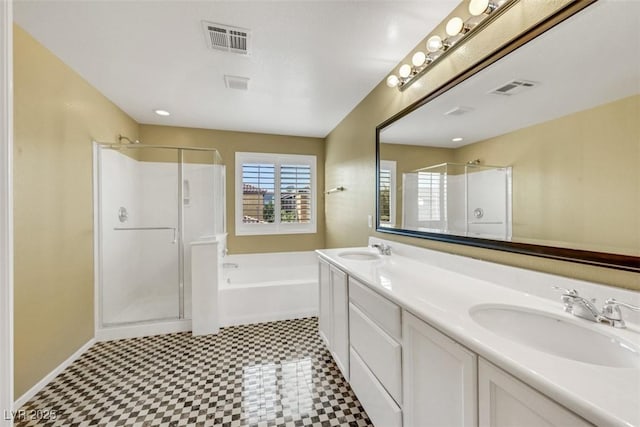 full bathroom with a shower stall, visible vents, and a sink