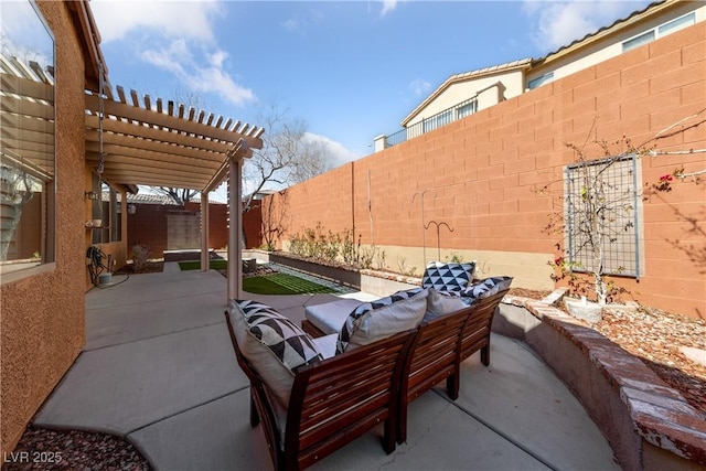 view of patio featuring a fenced backyard, an outdoor hangout area, and a pergola