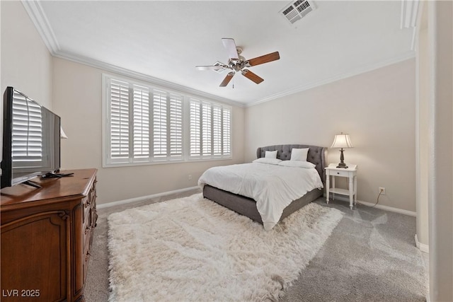 carpeted bedroom featuring baseboards, visible vents, ornamental molding, and ceiling fan