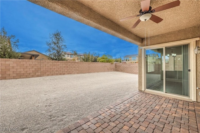 view of patio / terrace with ceiling fan and a fenced backyard