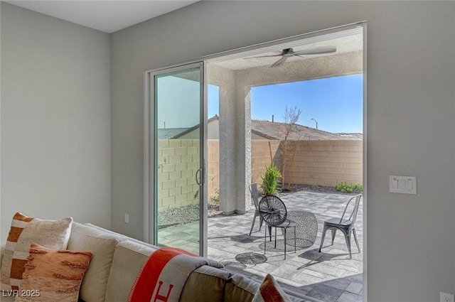 entryway featuring a ceiling fan and plenty of natural light