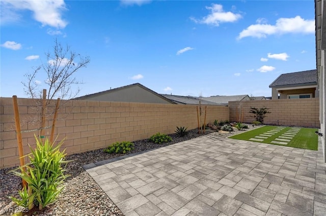 view of patio featuring a fenced backyard