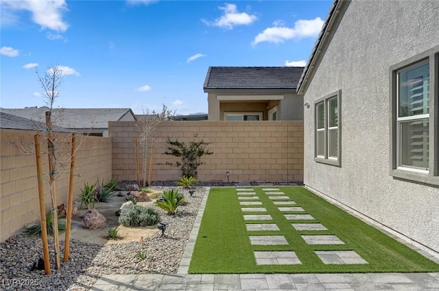 view of yard featuring a fenced backyard